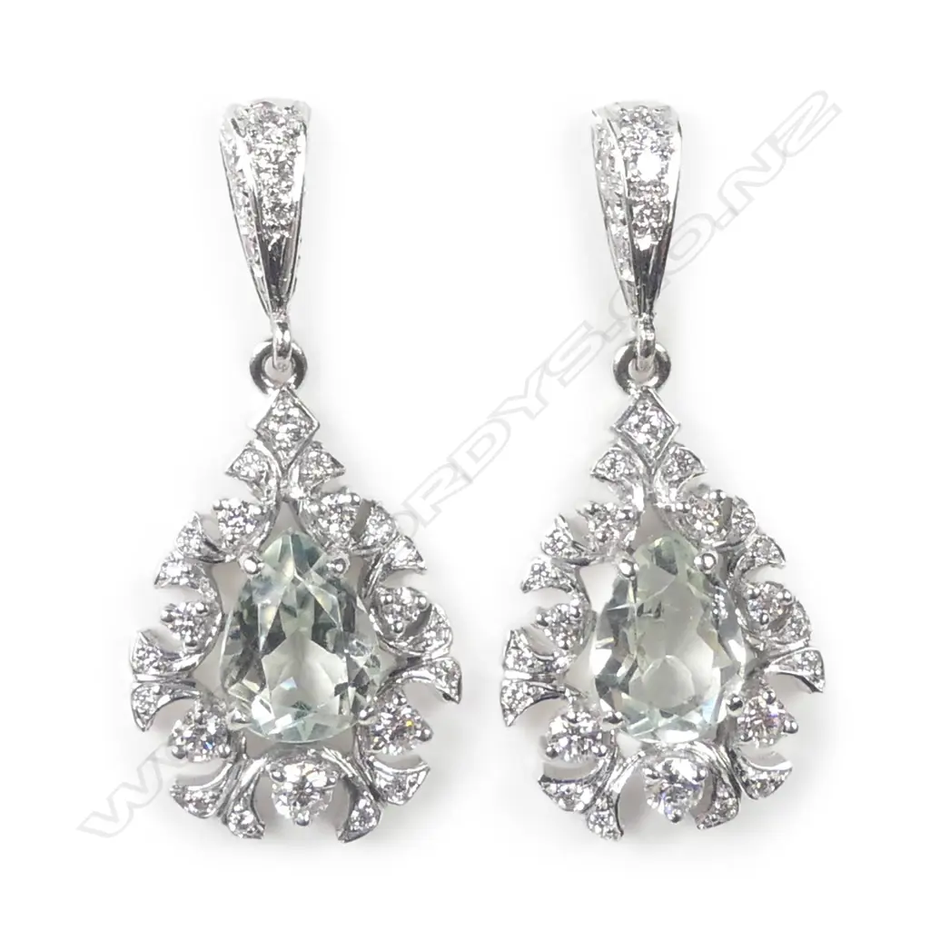 A pair of 18ct white gold diamond and green quartz earrings Image 1++