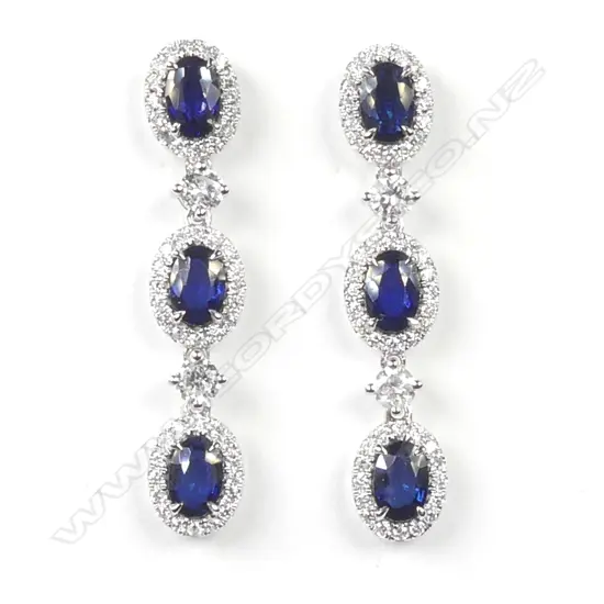 A pair of platinum sapphire and diamond drop earrings
