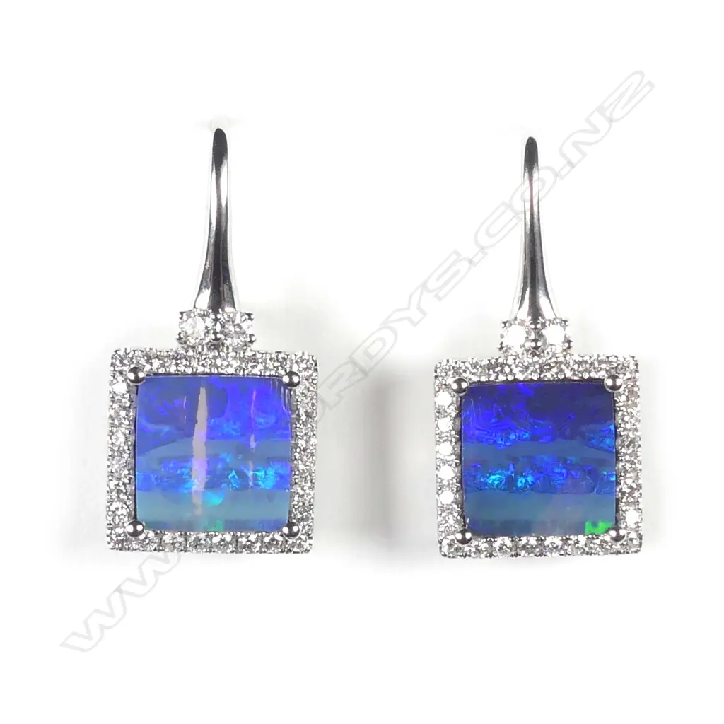 A pair of 14ct white gold opal and diamond drop earrings Image 1++