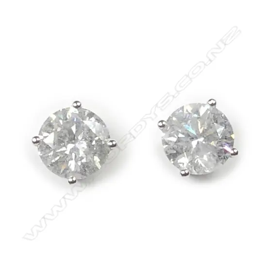 A pair of 18ct white gold and diamond stud earrings