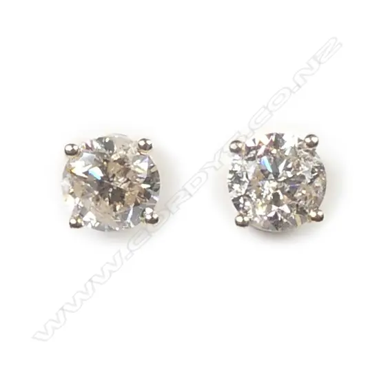 A pair of 14ct gold diamond stud earrings