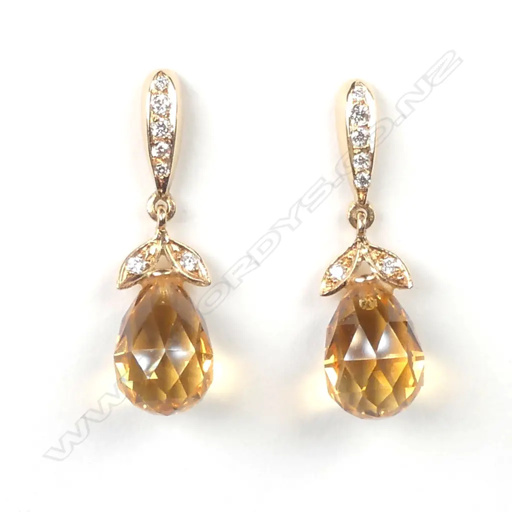A pair of 18ct rose gold diamond and topaz earrings Image 1++
