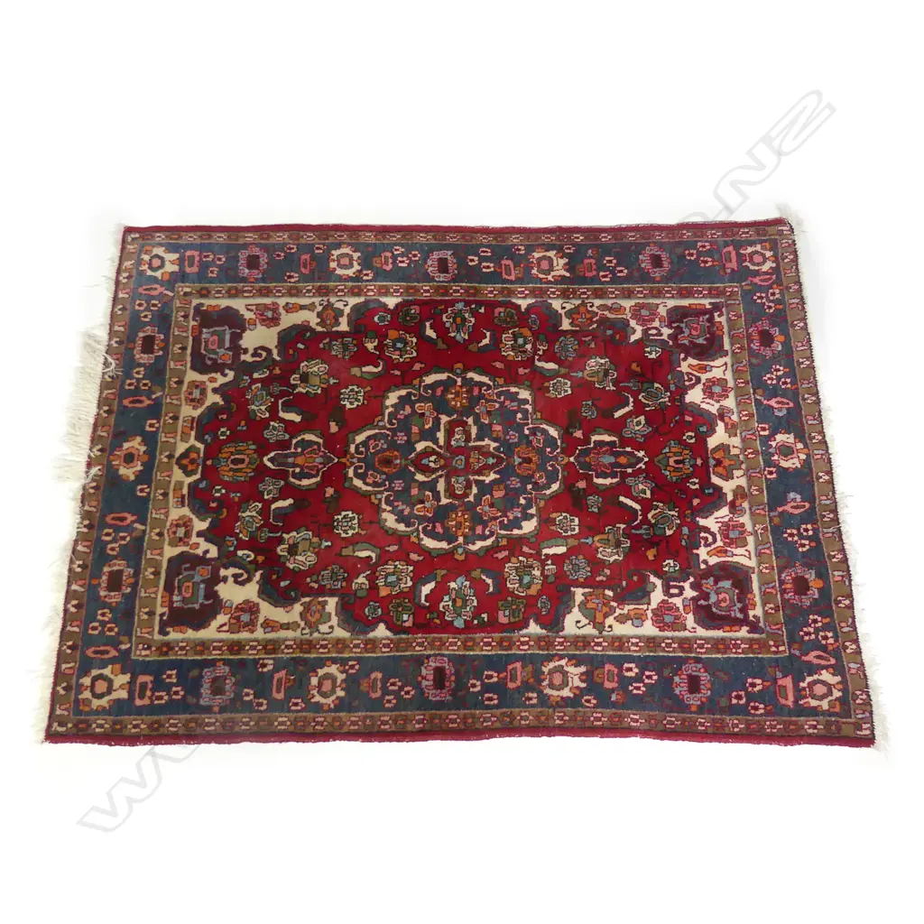 A hand knotted Persian rug Image 1++