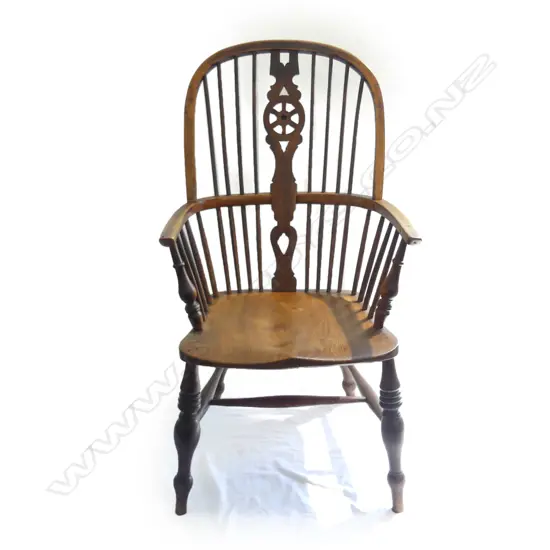 An 19thC English birch and elm Windsor elbow chair