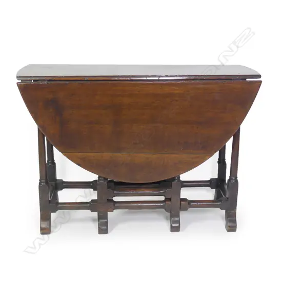 A Georgian oak gateleg table