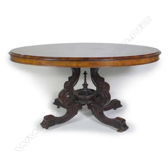 A superb Victorian oyster shell walnut loo table