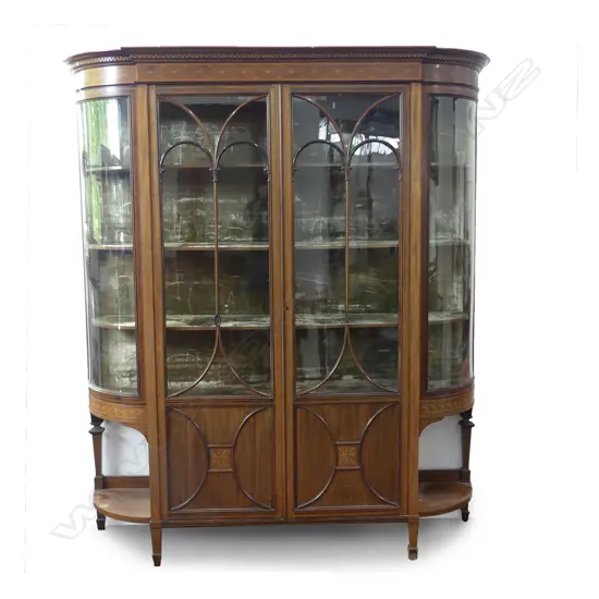 An impressive Edwardian mahogany Sheraton Revival display cabinet