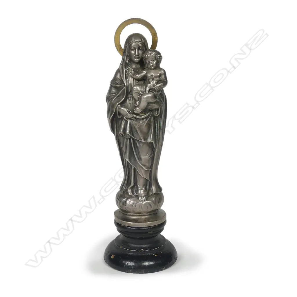 A fine silvered metal votive figure Image 1++