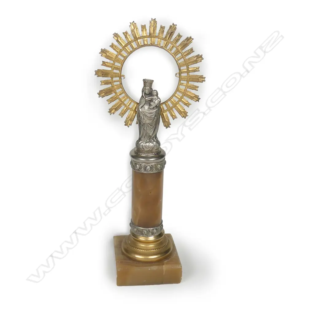 A small silvered metal religious votive figure Image 1++