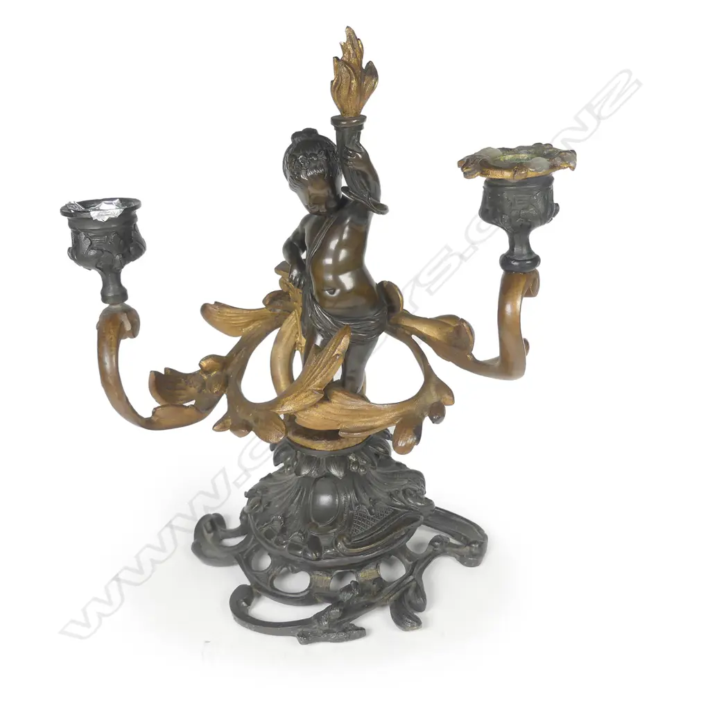 A good 19thC French bronze and gilt cherub figured table candelabra Image 1++