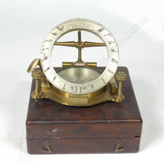 An uncommon late 19thC lacquered brass portable sundial by T & H Doublet