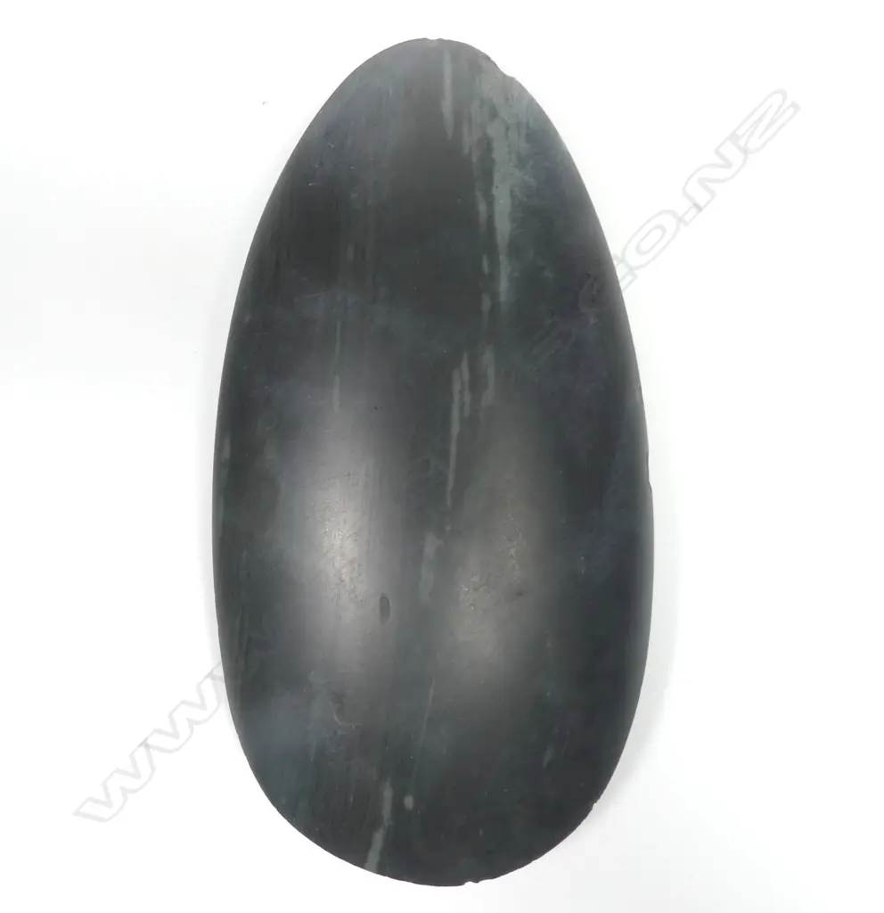 An old New Guinea stone adze blade of swollen ovoid form Image 1++