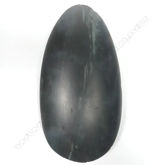 An old New Guinea stone adze blade of swollen ovoid form