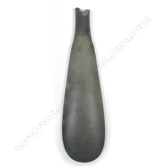 A Maori pre-European patu onewa (stone hand club)