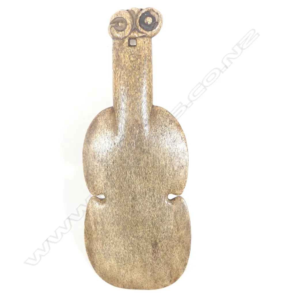 A quality 19thC Maori carved whalebone kotiate (hand club) Image 1++