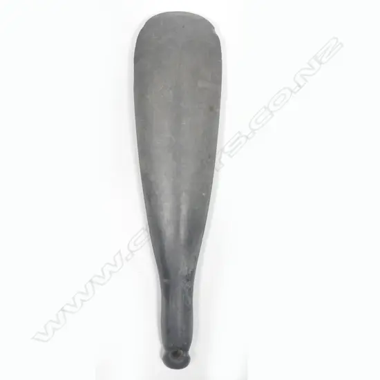 A stone hand club with modified grip