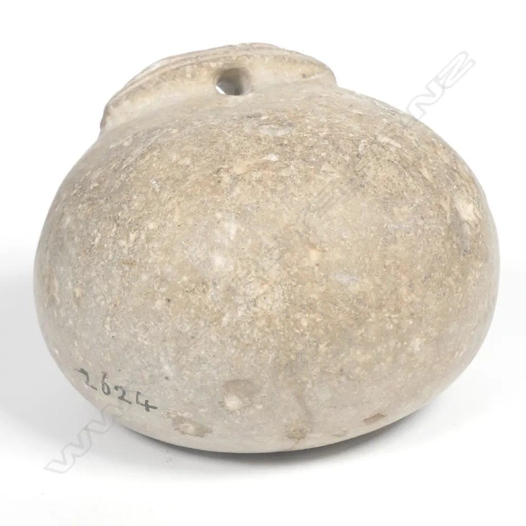 An old Maori notch topped stone sinker Image 1++