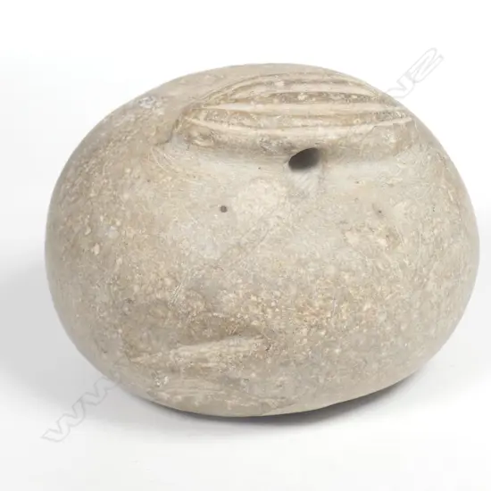 An old Maori notch topped stone sinker