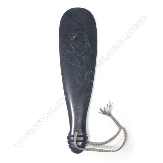 A deep green nephrite mere