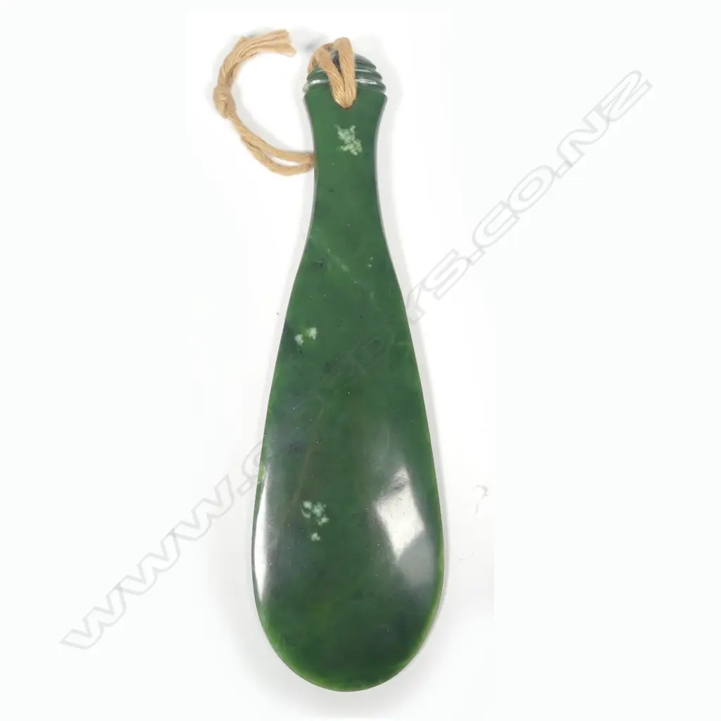 A Charlie Wilson nephrite mere of traditional form with large spatula formed blade waisted grip and triple ring groove to the butt Image 1++