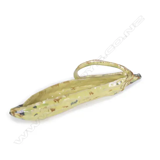 An uncommon Mollé Goodsell yellow glazed sculpted banana trough vase