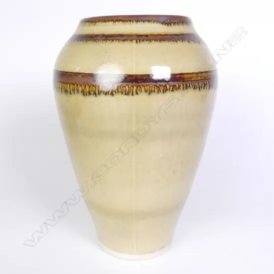 An O.C. Stephens tall ovoid stoneware vase