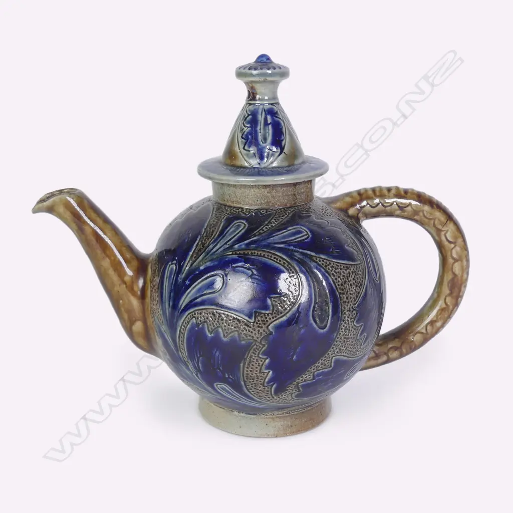 An unusual Martin Brothers salt-glazed stoneware teapot and cover Image 1++