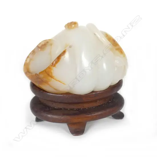 A Chinese mutton fat jade handling piece