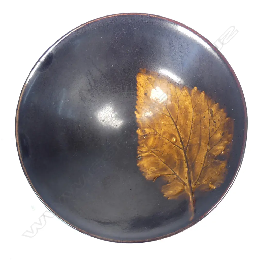 A Chinese jizhou ware leaf decorated tea bowl Image 1++