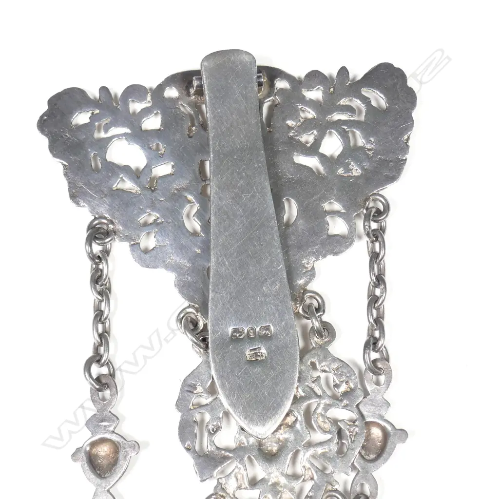 A Victorian silver chatelaine Image 1++