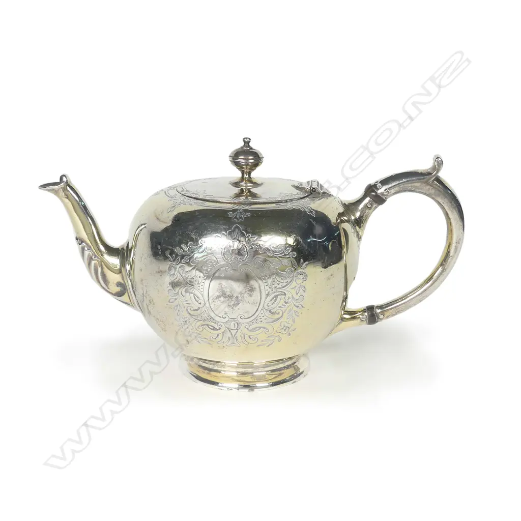 A Victorian silver George I style bullet teapot Image 1++