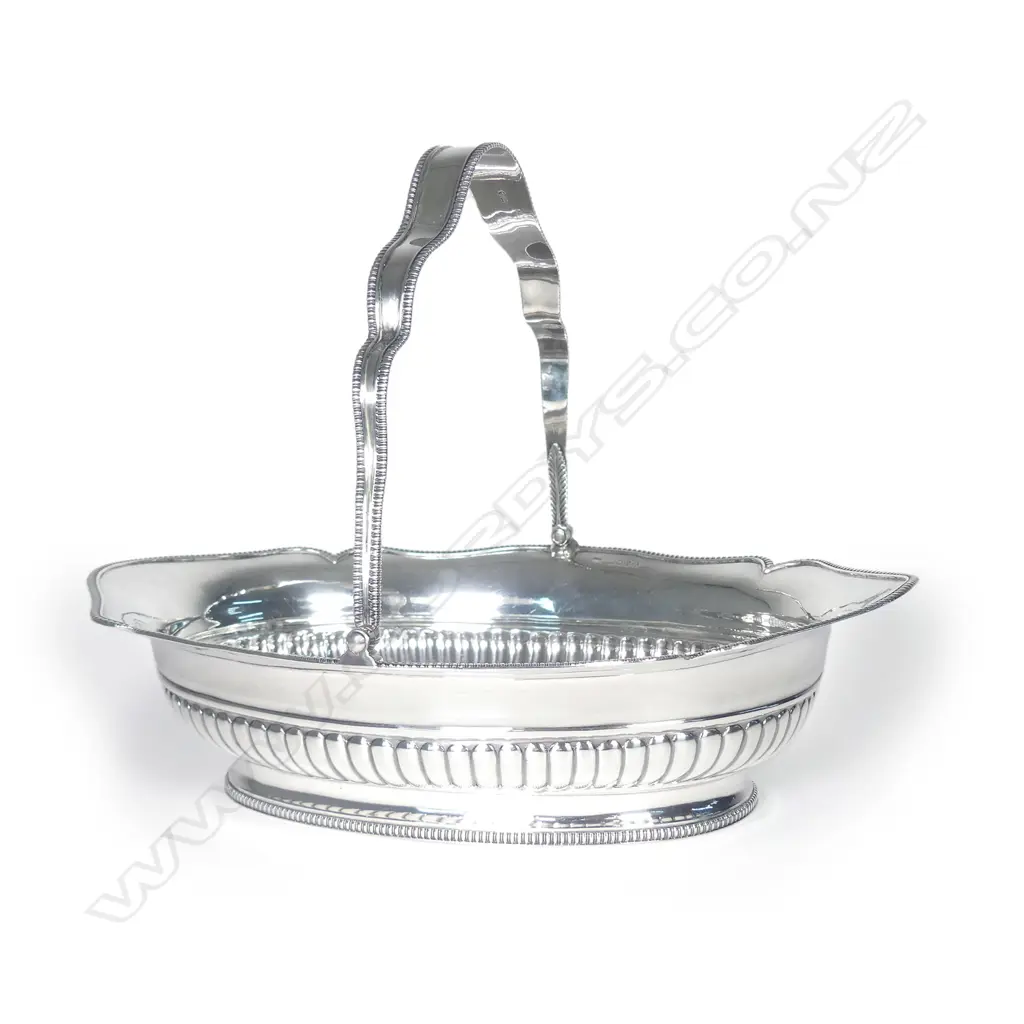 A George III silver handled fruit basket Image 1++