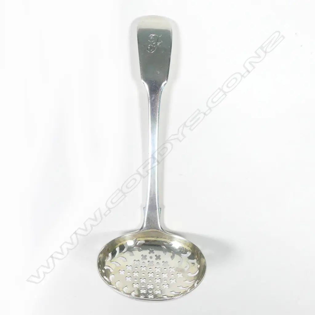 A George III silver sifter ladle Image 1++