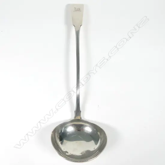 An Irish George III silver soup ladle
