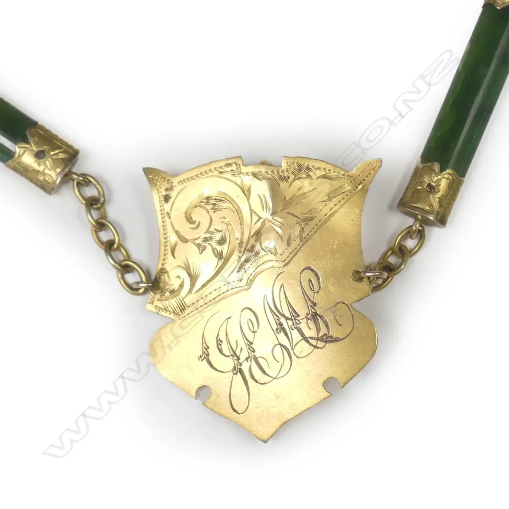 An early 2othc 9ct nephrite Albert chain Image 1++