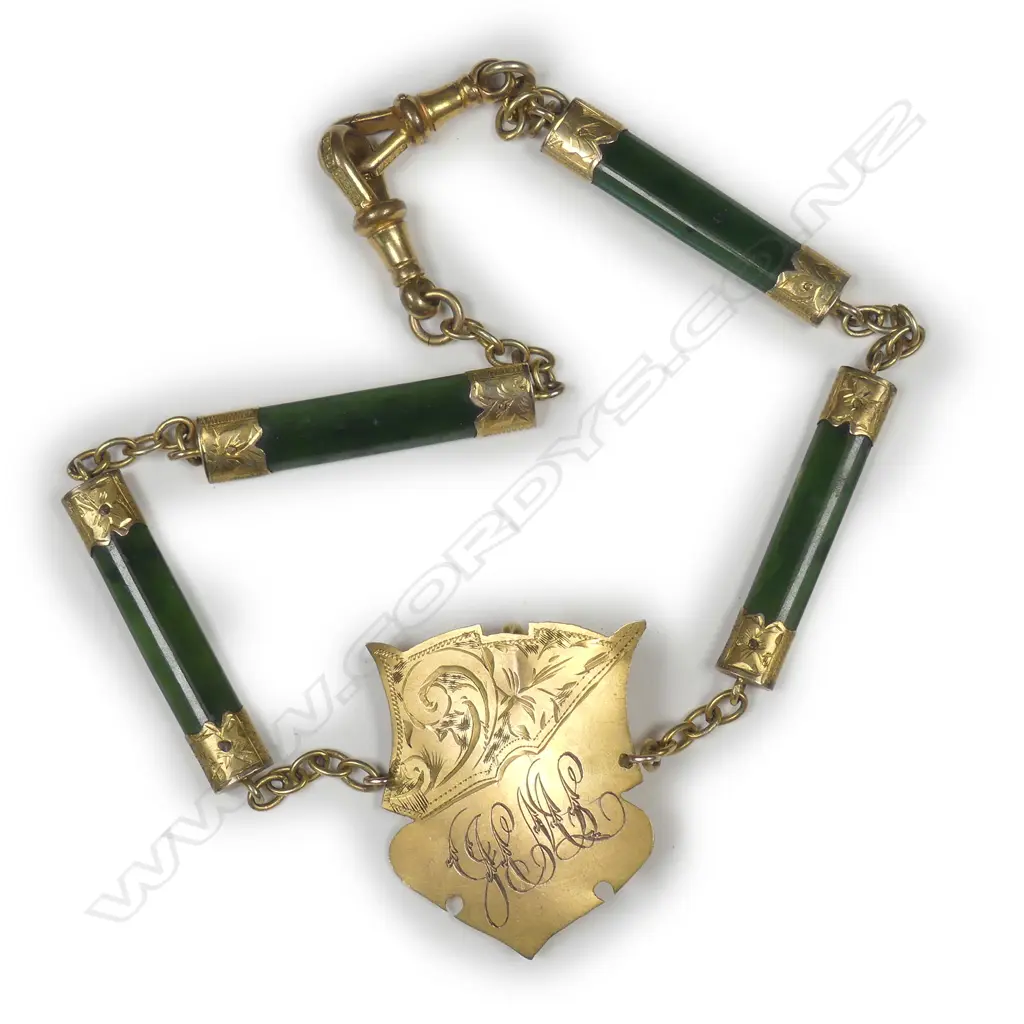 An early 2othc 9ct nephrite Albert chain Image 1++