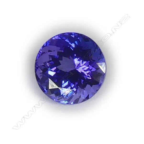 A 5.1ct round facet cut tanzanite Image 1++