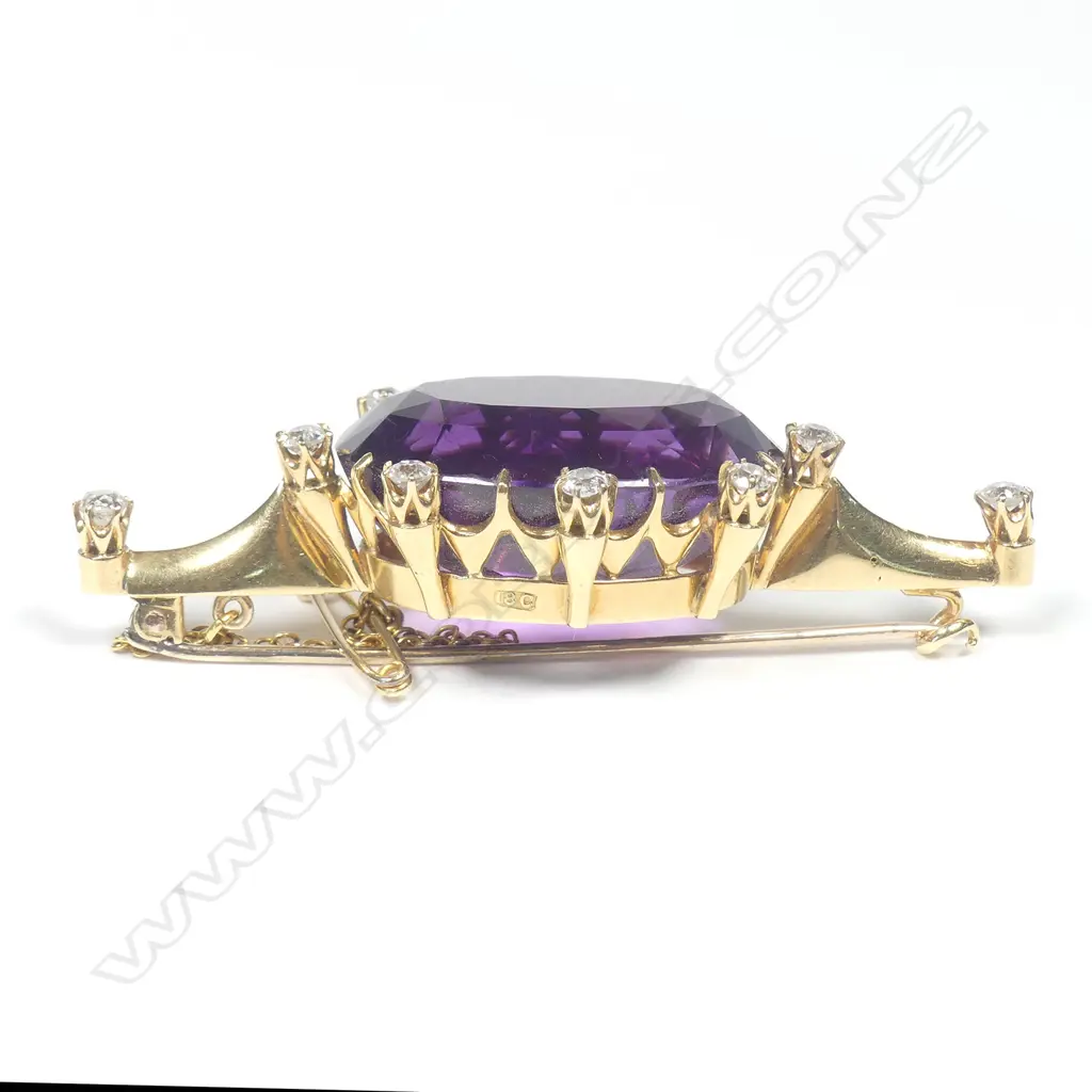 An impressive 18ct gold amethyst and diamond brooch Image 1++