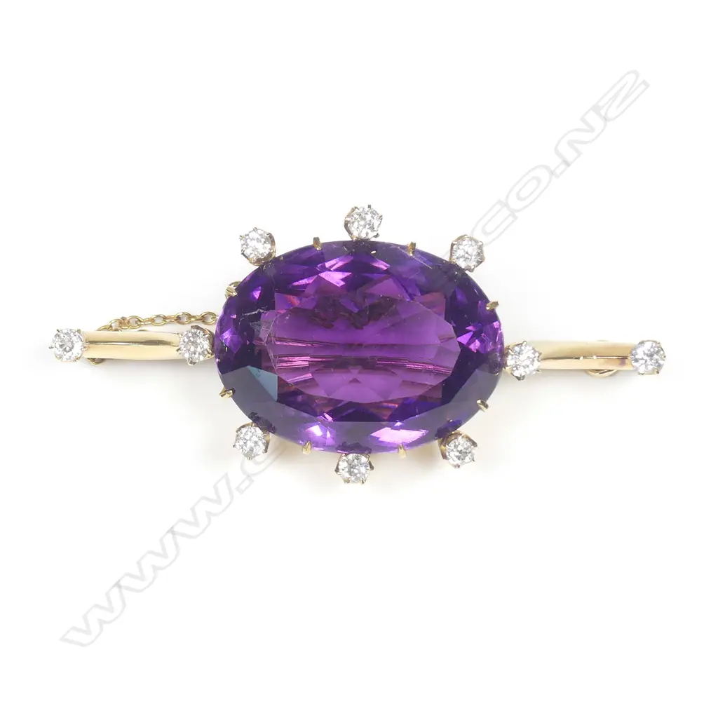 An impressive 18ct gold amethyst and diamond brooch Image 1++