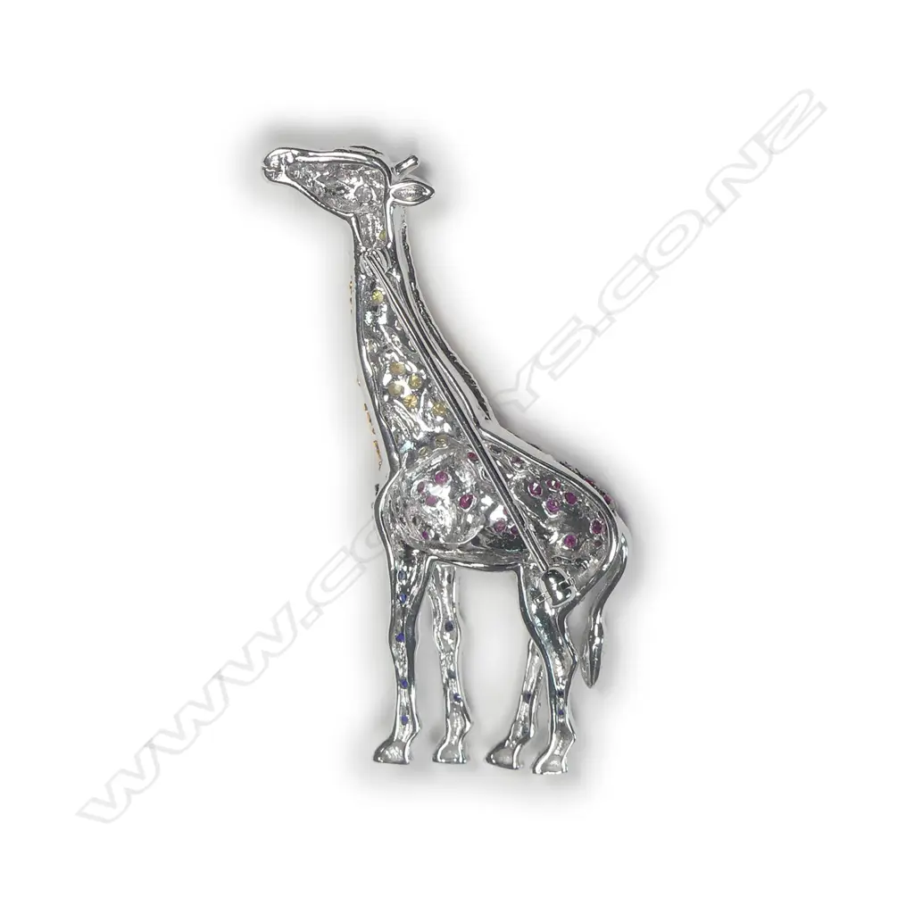 A 9ct. white gold and three colour sapphire encrusted giraffe pendant brooch Image 1++