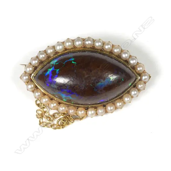 A 15ct yellow gold framed boulder opal and seed pearl brooch