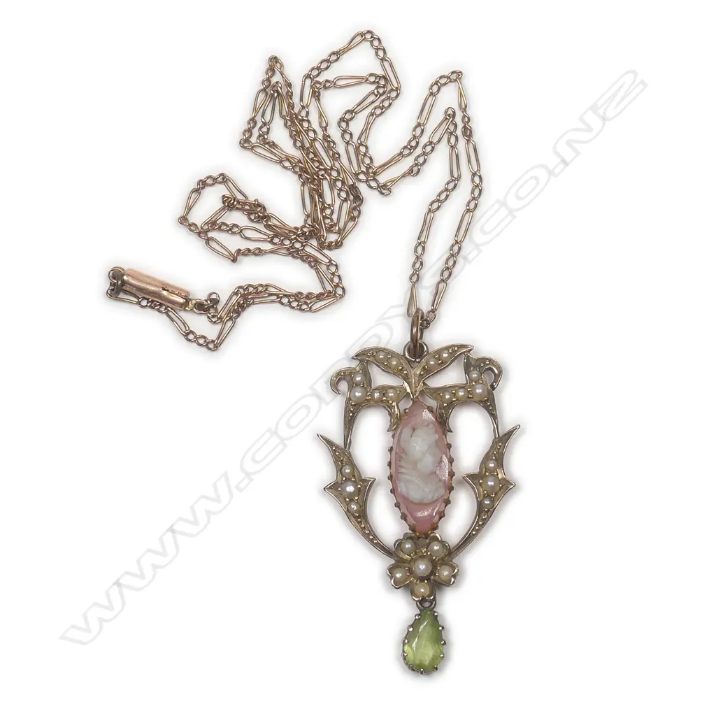 An Edwardian 9ct. yellow gold seed pearl and cameo pendant on chain Image 1++