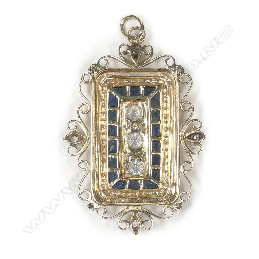 A 14ct yellow gold sapphire and diamond pendant Image 1++