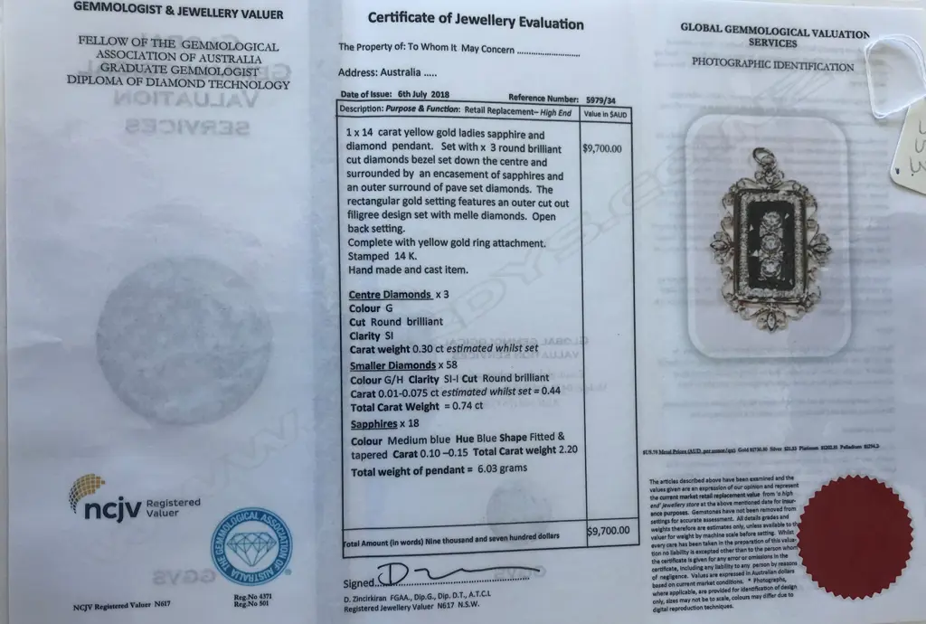A 14ct yellow gold sapphire and diamond pendant Image 1++