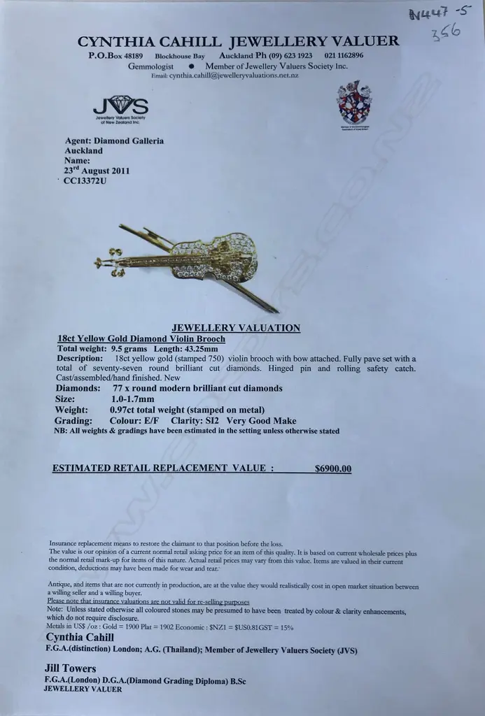 A modern 18ct. yellow gold and diamond set violin form pendant/brooch Image 1++