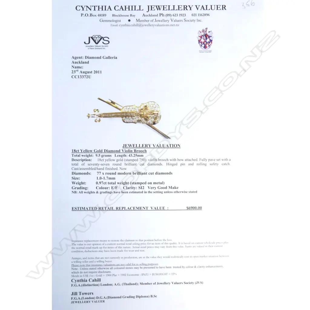 A modern 18ct. yellow gold and diamond set violin form pendant/brooch Image 1++