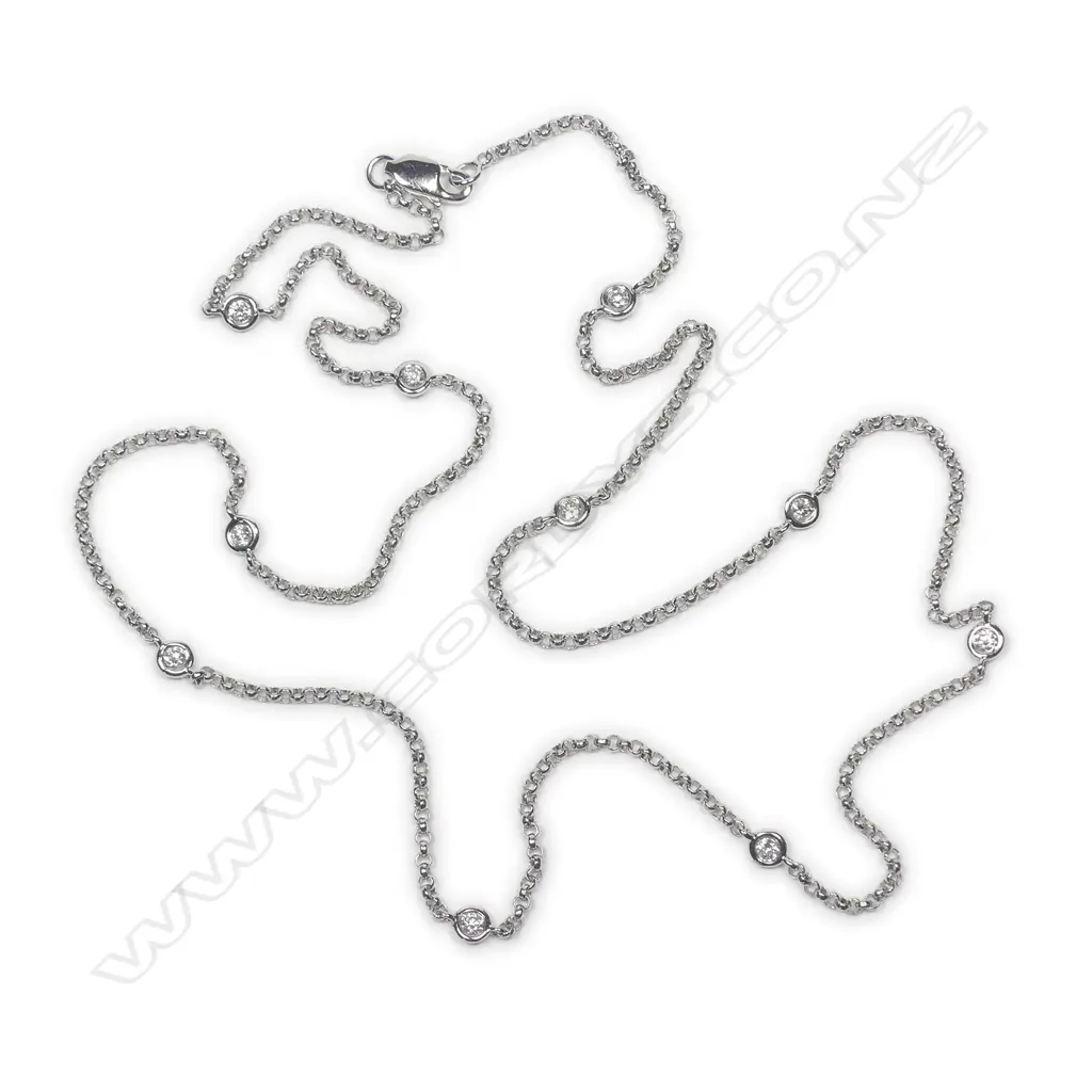 An 18ct. white gold and diamond set necklace Image 1++