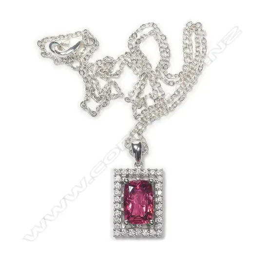 An 18ct. white gold pink tourmaline and diamond pendant