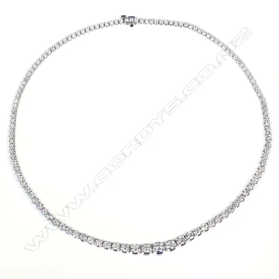 An impressive 18ct. white gold and graduated diamond set necklace
