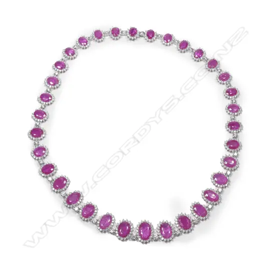 A platinum ruby and diamond necklace